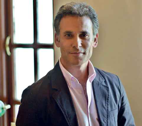 Matthew Amroliwala posng for the camera. net worth, assets, income, earning